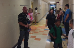 Parents Walk Their Students to Class