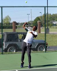 Akil serving